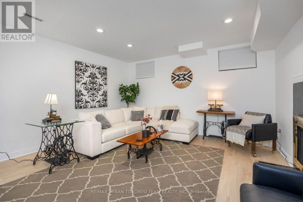 Cozy Boho-style basement family room with relocated TV and sofa.