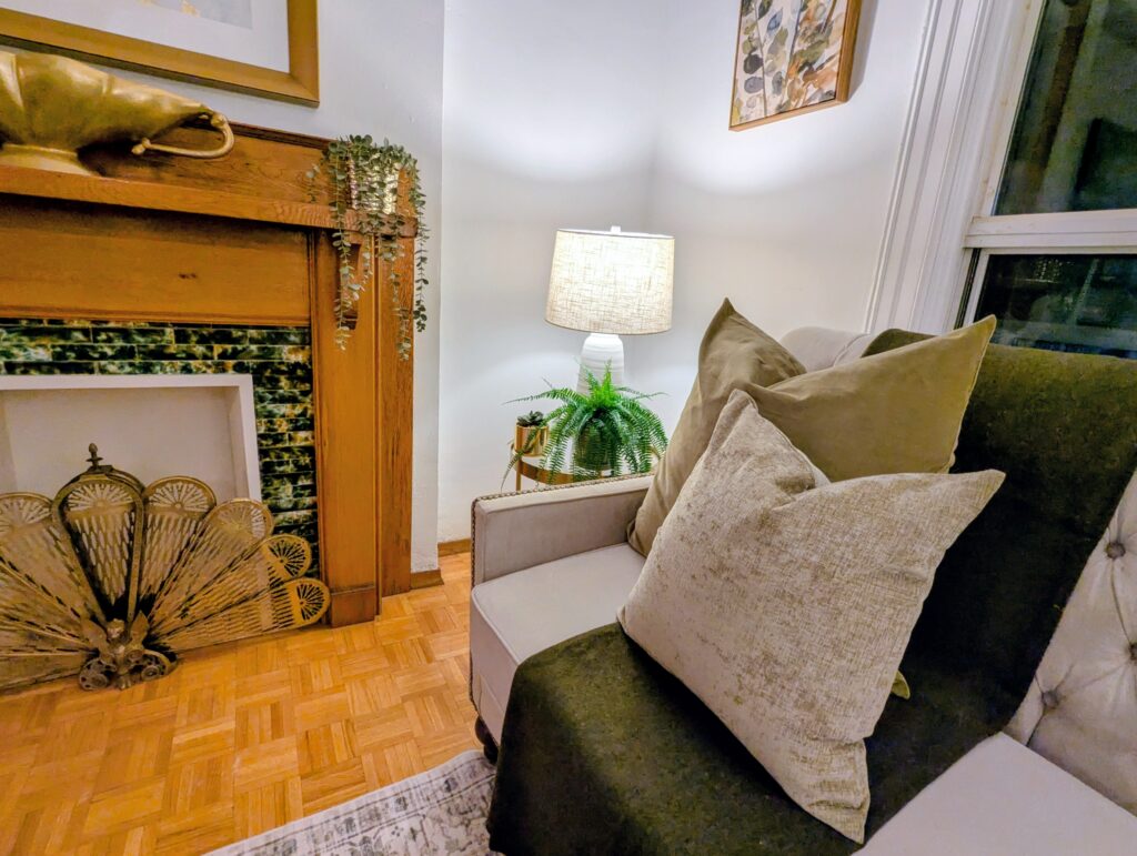 tonal green cushions, green tile work, green plants, green artwork all pulling in a green theme.