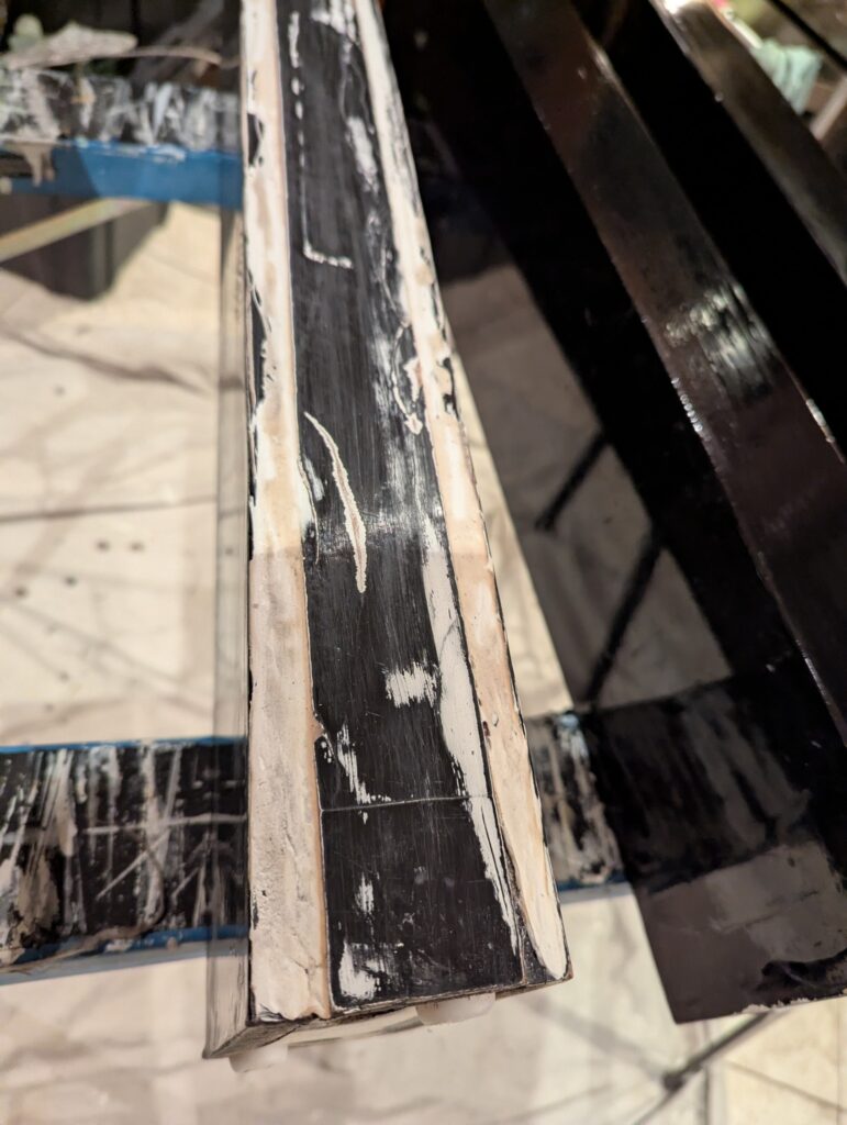 Damaged table leg durning the restoration process.